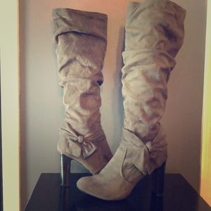 Gray faux suede boots.